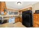 Functional kitchen with ample cabinet space and modern appliances, offers great natural light at 10433 Red Mountain W, Littleton, CO 80127