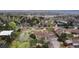 Aerial view of property featuring mature trees, landscaping, and red property line overlay at 2020 Routt St, Lakewood, CO 80215