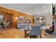 Spacious living room with hardwood floors, fireplace, and natural light at 2020 Routt St, Lakewood, CO 80215