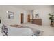 Spacious main bedroom with a neutral palette and ample closet space at 2020 Routt St, Lakewood, CO 80215