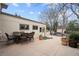 Outdoor patio area with dining table and chairs at 2020 Routt St, Lakewood, CO 80215