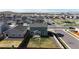 Aerial view showcasing the home's backyard, neighborhood, and street access at 17947 E 95Th Ave, Commerce City, CO 80022