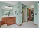 Bathroom features a vanity, shower with glass door and tile flooring at 1972 Gold Camp Way, Franktown, CO 80116