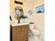 Well-lit bathroom with modern fixtures and stylish accents at 5563 E Jefferson Ave, Denver, CO 80237