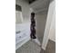Compact stall shower in a tiled corner of a carpeted room with a floral shower curtain at 1717 Oswego St, Aurora, CO 80010