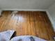 Original hardwood floor needing refinishing but showing the potential of this great space to shine at 1717 Oswego St, Aurora, CO 80010