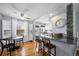 Open-concept kitchen with granite countertops and stainless steel appliances at 2823 Jasmine St, Denver, CO 80207