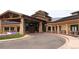 Stunning clubhouse exterior featuring stone accents, large windows, and an inviting entrance at 8216 S Tempe Ct, Aurora, CO 80016