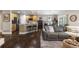 Bright, open living space with a combined kitchen and living room area for entertaining and living at 8216 S Tempe Ct, Aurora, CO 80016