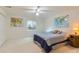 Bright bedroom with neutral walls, comfortable bed, and ceiling fan at 884 W 124Th Dr, Denver, CO 80234