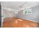 Spacious finished basement with beautiful hardwood floors and ample natural light at 1244 S Wright St, Lakewood, CO 80228