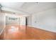 Large finished basement with hardwood floors, updated lighting and multiple egresses at 1244 S Wright St, Lakewood, CO 80228