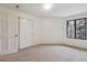 Well lit bedroom with large sliding closet at 836 S Vance St # E, Lakewood, CO 80226