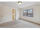 Neutral bedroom with large window bringing in natural light at 836 S Vance St # E, Lakewood, CO 80226