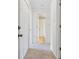 Hallway featuring a full bathroom with tub/shower combination at 836 S Vance St # E, Lakewood, CO 80226