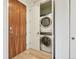 Convenient laundry area with stacked washer and dryer, optimizing space and functionality at 1735 Central St # 208, Denver, CO 80211
