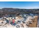 Aerial view highlighting house location in a community with mountain views at 5272 Country Club Dr, Larkspur, CO 80118