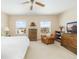 Main bedroom with mountain views, and two wood dressers at 5272 Country Club Dr, Larkspur, CO 80118