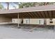 Covered parking area with reserved spaces and well-maintained pavement at 9700 E Iliff Ave # G70, Denver, CO 80231