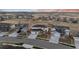 Overhead view of a modern home within a well-planned community and open space at 14373 Shasta Daisy Pt, Parker, CO 80134