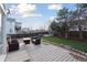 Spacious backyard featuring a deck, comfortable patio furniture, and a grassy area at 1534 Stanley Dr, Erie, CO 80516