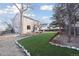 Wide backyard with artificial grass, offering a low-maintenance and inviting outdoor space at 1534 Stanley Dr, Erie, CO 80516
