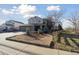 Beautiful two-story home with a three-car garage, landscaped yard, and inviting curb appeal at 1534 Stanley Dr, Erie, CO 80516