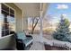 Cozy front porch with comfortable seating and a view of the neighborhood at 1534 Stanley Dr, Erie, CO 80516