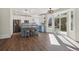 Open kitchen with large island, modern appliances, and sliding glass doors to the backyard at 1534 Stanley Dr, Erie, CO 80516