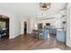Open concept kitchen with a large island, bar stool seating, and modern appliances at 1534 Stanley Dr, Erie, CO 80516