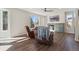 Comfortable living room with leather recliners, a fireplace, and large windows at 1534 Stanley Dr, Erie, CO 80516