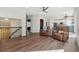 Spacious open floor plan with living room and kitchen areas, featuring modern furnishings at 1534 Stanley Dr, Erie, CO 80516