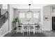 Elegant dining room with decorative chandelier, and stylish decor at 6037 N Netherland Ct, Aurora, CO 80019