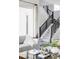Cozy living room featuring a staircase and comfortable seating at 6037 N Netherland Ct, Aurora, CO 80019