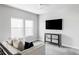 Cozy upstairs living area with plush seating, lots of natural light, and media center at 6037 N Netherland Ct, Aurora, CO 80019