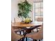 Modern dining table with seating for six, perfect for Gathering meals and entertaining at 18824 Robins Dr, Denver, CO 80249
