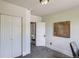 Bedroom featuring a walk-in closet and bathroom with clawfoot tub at 2564 N Emerson St, Denver, CO 80205