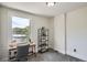 Bedroom featuring a desk, chair, and built-in bookshelves at 2564 N Emerson St, Denver, CO 80205
