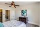 Relaxing bedroom with a ceiling fan and direct access to a closet at 2564 N Emerson St, Denver, CO 80205