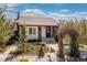 A quaint home with manicured garden and a welcoming front entrance at 3176 Depew St, Wheat Ridge, CO 80214