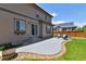 Backyard with patio, lounge furniture, grass, and view of the house with solar panels at 76 N Ider St, Aurora, CO 80018
