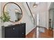 Welcoming entryway with high ceilings, hardwood floors, and attractive decor at 76 N Ider St, Aurora, CO 80018