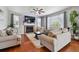 Cozy living room featuring a fireplace, hardwood floors, and comfortable seating at 76 N Ider St, Aurora, CO 80018