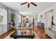 Inviting living room featuring an open floor plan, hardwood floors, and stylish décor at 76 N Ider St, Aurora, CO 80018
