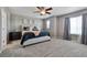 Comfortable bedroom with neutral paint, plush carpet, and a ceiling fan at 76 N Ider St, Aurora, CO 80018