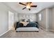 Spacious bedroom with comfortable accents and an overhead ceiling fan at 76 N Ider St, Aurora, CO 80018