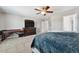 Bedroom with a desk, dresser, and comfortable bedding at 76 N Ider St, Aurora, CO 80018