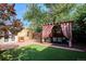 Beautiful backyard featuring a pergola, patio, and lush green space, perfect for outdoor enjoyment at 263 N Logan St, Denver, CO 80203