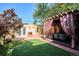 Spacious backyard with a pergola, patio area and artificial grass, ideal for outdoor living at 263 N Logan St, Denver, CO 80203