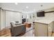 Cozy living space with a built-in desk, closet, and breakfast bar at 263 N Logan St, Denver, CO 80203